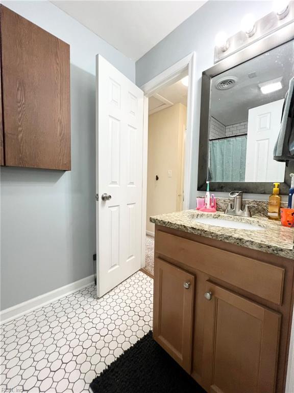 5806 Edith Ct, Virginia Beach, VA 23464 - bathroom featuring vanity and tile patterned floors