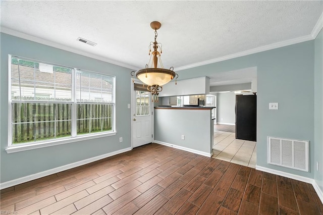 864 Page Pl, Newport News, VA 23608 - unfurnished dining area with wood tiled floors, ornamental molding, a textured ceiling, and a chandelier