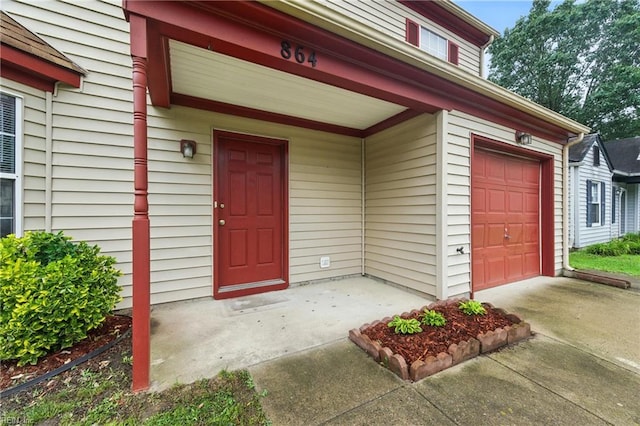 864 Page Pl, Newport News, VA 23608 - entrance to property featuring driveway and an attached garage