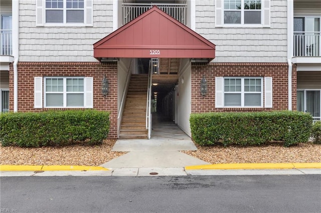 5205 Nuthall Dr Unit 202, Virginia Beach, VA 23455 - view of exterior entry with brick siding