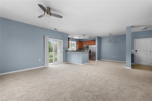 5205 Nuthall Dr Unit 202, Virginia Beach, VA 23455 - unfurnished living room featuring light carpet and a ceiling fan