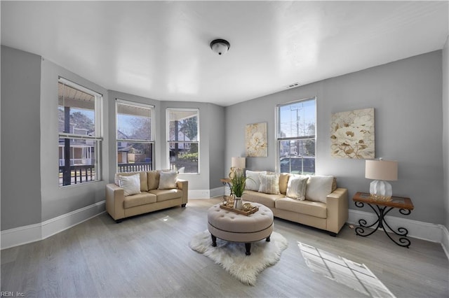1047 26th St, Newport News, VA 23607 - living area with wood finished floors and baseboards