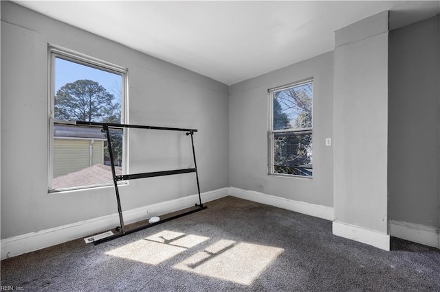 1047 26th St, Newport News, VA 23607 - empty room featuring carpet floors