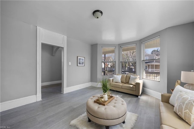 1047 26th St, Newport News, VA 23607 - living room featuring baseboards and light wood-type flooring
