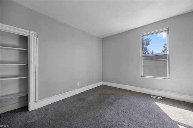 1047 26th St, Newport News, VA 23607 - unfurnished bedroom with carpet floors