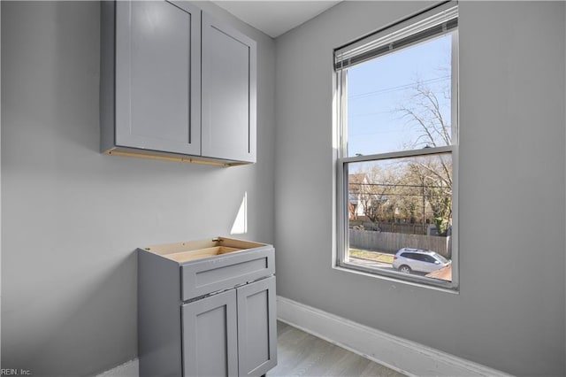 1047 26th St, Newport News, VA 23607 - detailed view of baseboards and wood finished floors