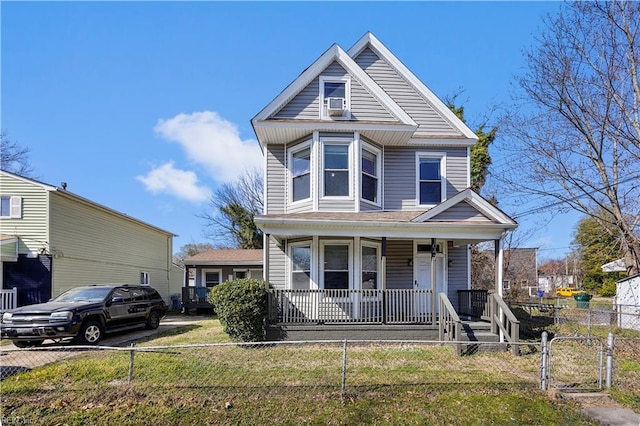 1047 26th St, Newport News, VA 23607 - view of front facade featuring covered porch, a fenced front yard, and a gate