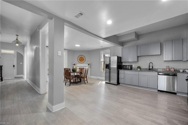 1047 26th St, Newport News, VA 23607 - kitchen with stainless steel appliances, gray cabinets, light wood-style flooring, and recessed lighting