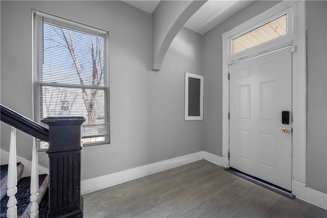 1047 26th St, Newport News, VA 23607 - entryway with arched walkways, wood finished floors, and stairs