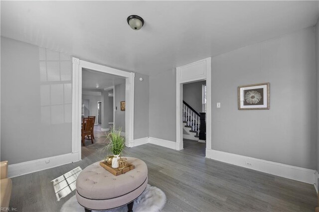 1047 26th St, Newport News, VA 23607 - living area featuring stairway and wood finished floors
