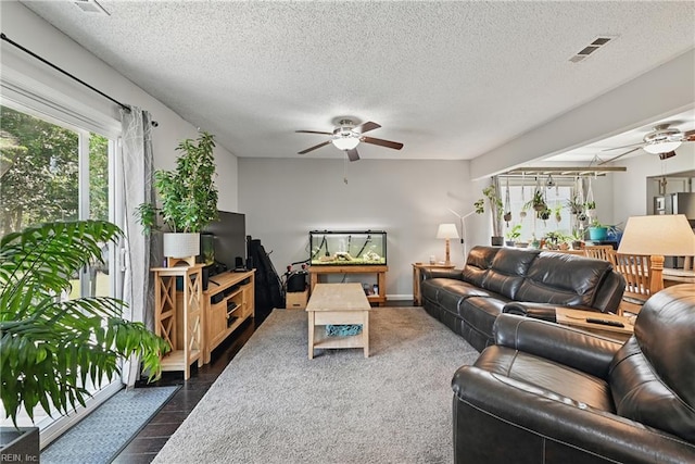 1712 Willwood Ct, Virginia Beach, VA 23464 - living room featuring ceiling fan, healthy amount of natural light, and a textured ceiling