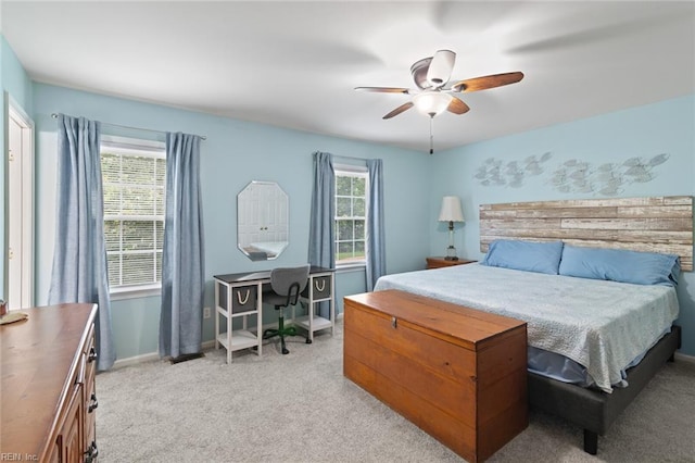 301 Ashland Ct, Newport News, VA 23606 - bedroom featuring light colored carpet, a ceiling fan, and a desk