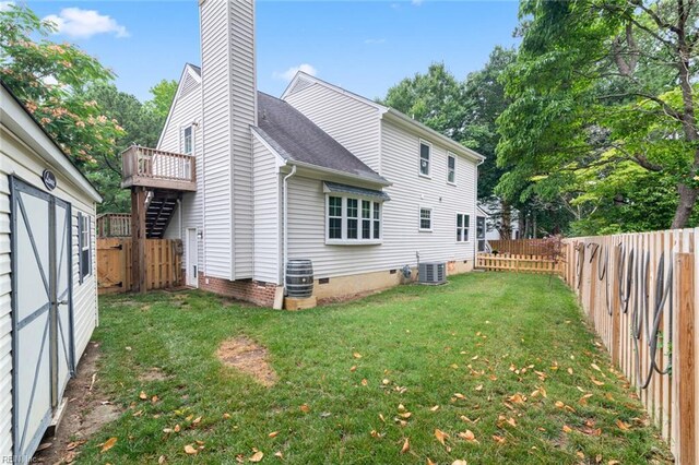 301 Ashland Ct, Newport News, VA 23606 - rear view of house with crawl space, a fenced backyard, a chimney, and a shingled roof