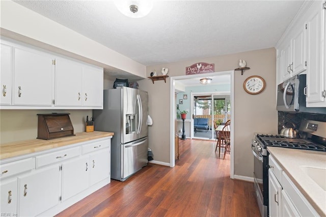 301 Ashland Ct, Newport News, VA 23606 - kitchen featuring stainless steel appliances, a textured ceiling, white cabinetry, dark wood-type flooring, and light countertops