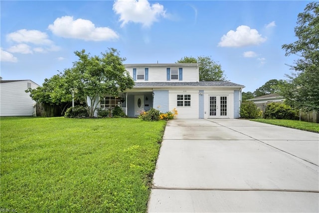 608 Woodbine Ln, Virginia Beach, VA 23452 - traditional home with french doors, driveway, and a front yard