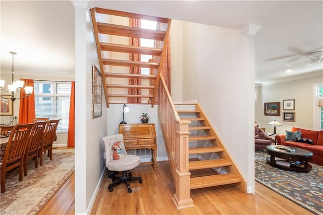 3516 Colmar Quarter Quarter, Norfolk, VA 23509 - stairs featuring crown molding, a chandelier, wood finished floors, and a ceiling fan