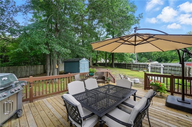 609 Robinold Ct, Chesapeake, VA 23322 - deck featuring outdoor dining area, a storage shed, a fenced backyard, and grilling area