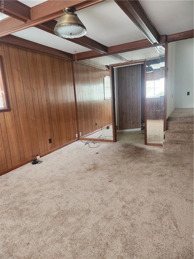 219 Cellardoor Ct, Hampton, VA 23666 - empty room featuring beamed ceiling, carpet floors, and wood walls