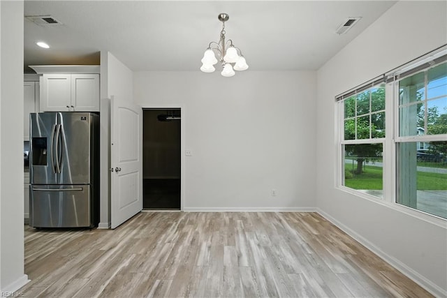 3005 Overbrook Ave, Norfolk, VA 23513 - unfurnished dining area featuring a chandelier and light wood-type flooring