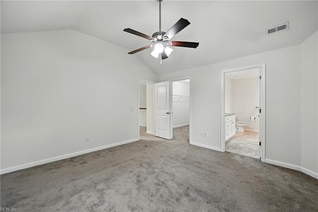 3005 Overbrook Ave, Norfolk, VA 23513 - unfurnished bedroom with vaulted ceiling, light carpet, a spacious closet, ensuite bathroom, and a closet