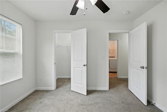 3005 Overbrook Ave, Norfolk, VA 23513 - unfurnished bedroom featuring light carpet, a spacious closet, washer / clothes dryer, a ceiling fan, and a closet