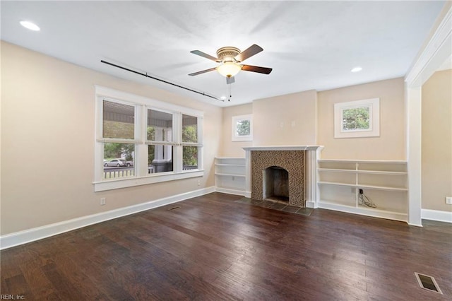 1718 Fontainebleau Cres, Norfolk, VA 23509 - unfurnished living room with ceiling fan, wood finished floors, a fireplace, and recessed lighting