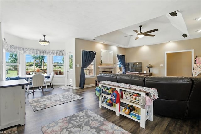 609 Trumpet Ct, Chesapeake, VA 23323 - living room featuring ceiling fan, a tray ceiling, and wood finished floors