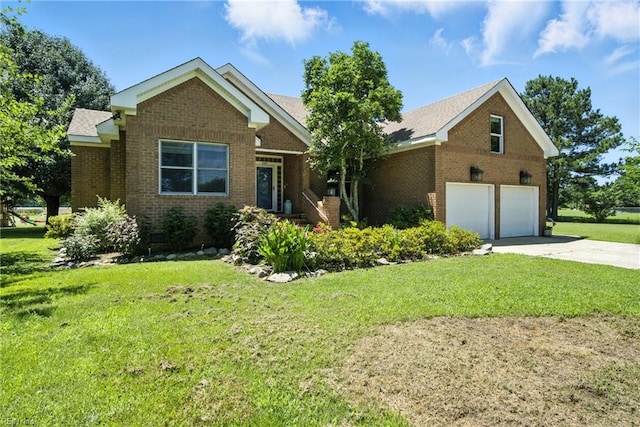 609 Trumpet Ct, Chesapeake, VA 23323 - view of front facade featuring brick siding, concrete driveway, and a front lawn