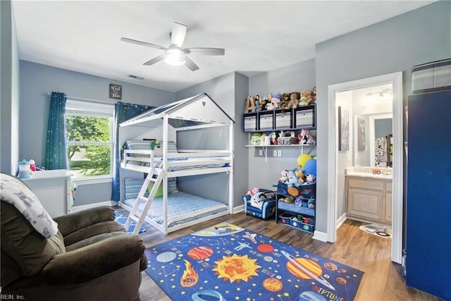 609 Trumpet Ct, Chesapeake, VA 23323 - bedroom featuring wood finished floors, connected bathroom, and ceiling fan