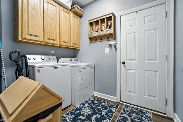 609 Trumpet Ct, Chesapeake, VA 23323 - washroom with cabinet space, separate washer and dryer, and dark wood-style floors