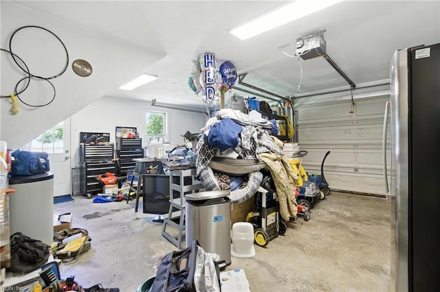 609 Trumpet Ct, Chesapeake, VA 23323 - garage featuring freestanding refrigerator and a garage door opener
