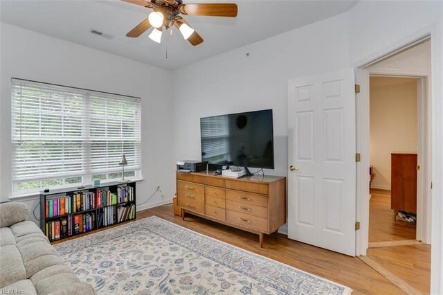 1004 Rustads Cir, Williamsburg, VA 23188 - living room featuring healthy amount of natural light, wood finished floors, and ceiling fan