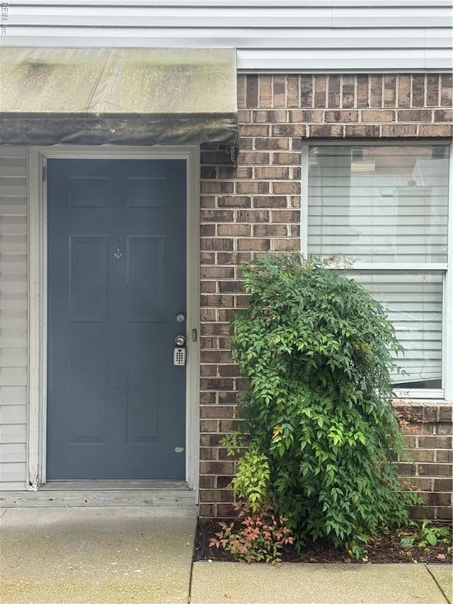 8570 Chesapeake Blvd Unit 17, Norfolk, VA 23503 - property entrance with brick siding