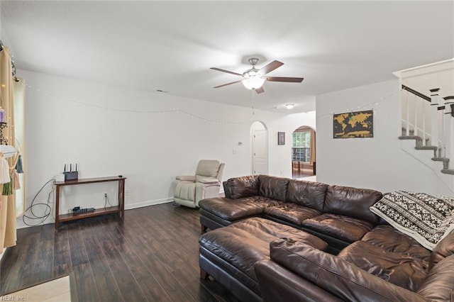 308 Queen Ct, Smithfield, VA 23430 - living area with arched walkways, ceiling fan, wood finished floors, and stairway