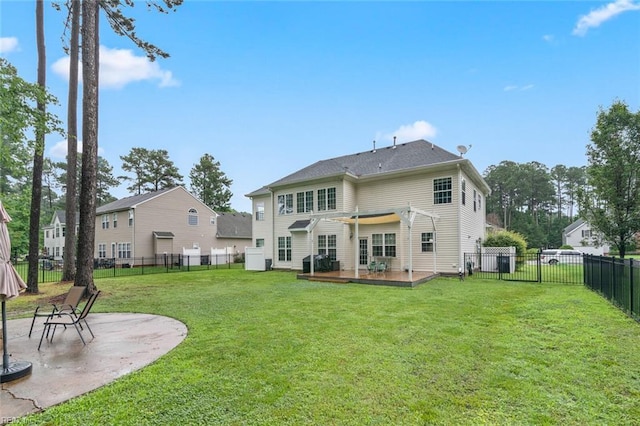 308 Queen Ct, Smithfield, VA 23430 - rear view of house with a fenced backyard, a deck, and a patio area