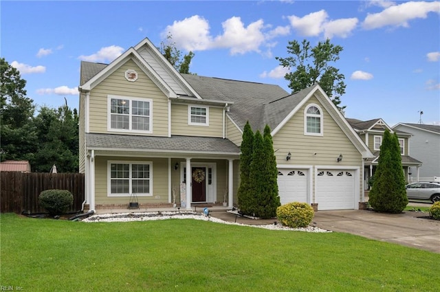 2559 Golden Maple Dr, Suffolk, VA 23434 - traditional home with concrete driveway, covered porch, a shingled roof, and a garage