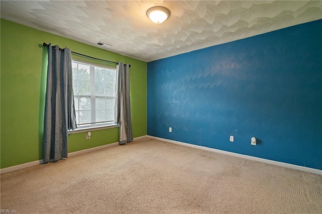 2559 Golden Maple Dr, Suffolk, VA 23434 - carpeted spare room with baseboards and a textured ceiling