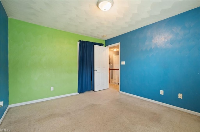 2559 Golden Maple Dr, Suffolk, VA 23434 - carpeted spare room featuring baseboards