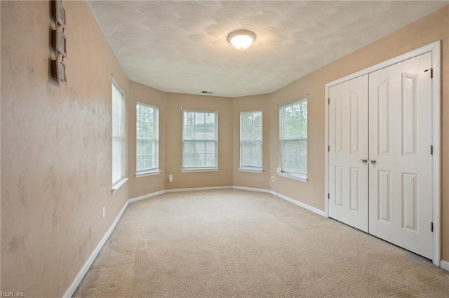 2559 Golden Maple Dr, Suffolk, VA 23434 - unfurnished bedroom with carpet and a closet