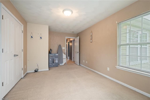 2559 Golden Maple Dr, Suffolk, VA 23434 - unfurnished bedroom with carpet floors and multiple windows