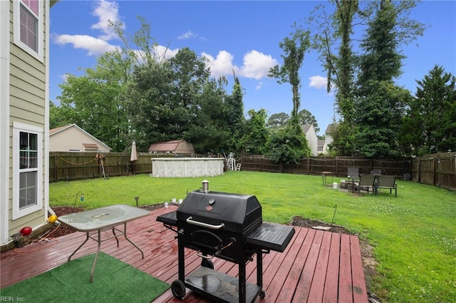 2559 Golden Maple Dr, Suffolk, VA 23434 - wooden deck with a grill, a fenced backyard, and an outdoor fire pit