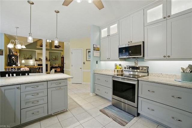 3644 Brannon Dr, Virginia Beach, VA 23456 - kitchen featuring stainless steel appliances, gray cabinetry, ceiling fan, and pendant lighting