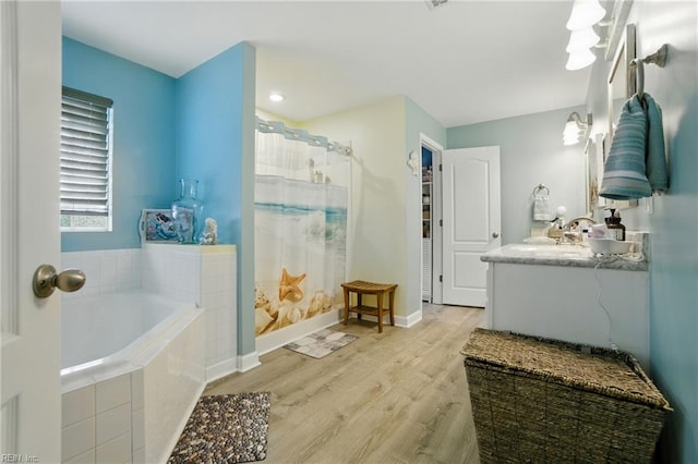 3644 Brannon Dr, Virginia Beach, VA 23456 - full bath featuring a bath, wood finished floors, vanity, and curtained shower