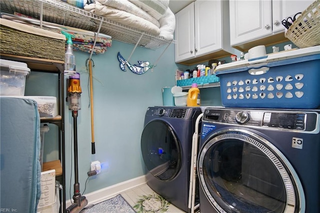 3644 Brannon Dr, Virginia Beach, VA 23456 - laundry room featuring independent washer and dryer, cabinet space, and light tile patterned floors