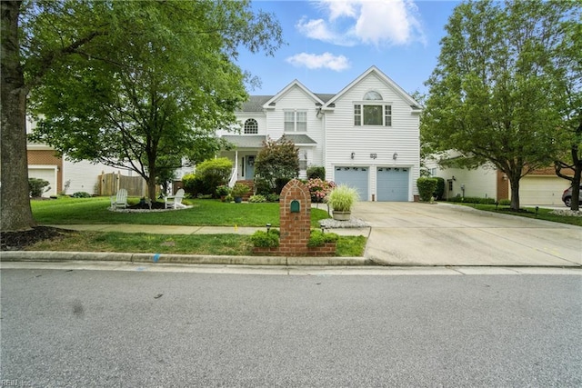 3644 Brannon Dr, Virginia Beach, VA 23456 - traditional home featuring concrete driveway, a front lawn, and a garage