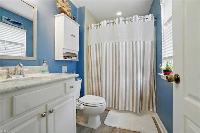 3644 Brannon Dr, Virginia Beach, VA 23456 - full bath featuring vanity, wood finished floors, and curtained shower