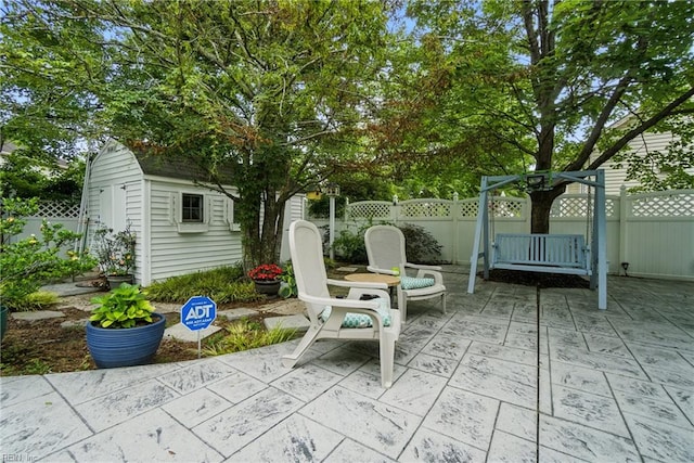 3644 Brannon Dr, Virginia Beach, VA 23456 - fenced backyard featuring a patio and a storage shed