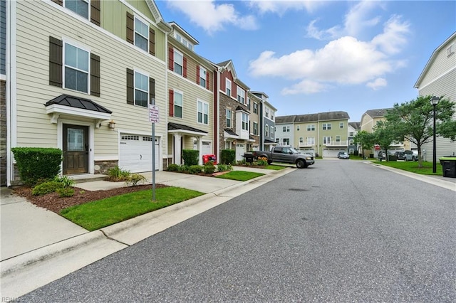4317 Salt Marsh Ln, Chesapeake, VA 23324 - view of asphalt street featuring a residential view, curbs, sidewalks, and street lights