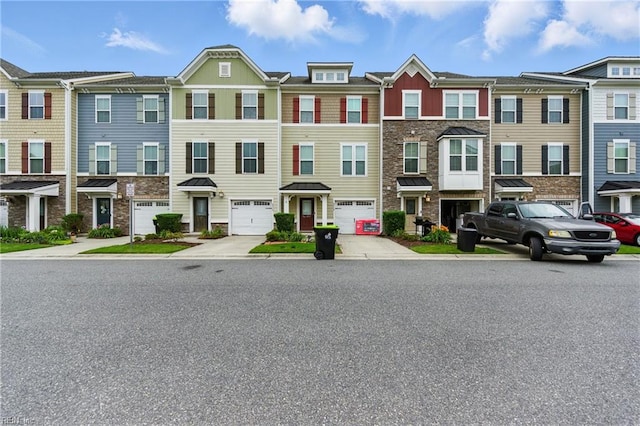 4317 Salt Marsh Ln, Chesapeake, VA 23324 - view of property with stone siding, driveway, a residential view, and board and batten siding