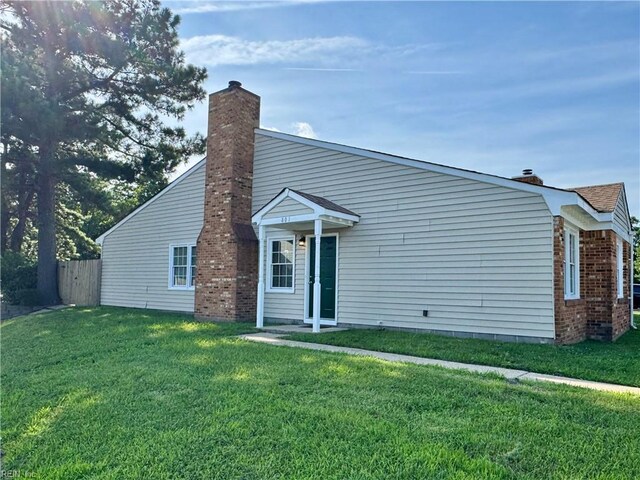 801 Chalk Ct, Virginia Beach, VA 23462 - mid-century inspired home with a chimney and brick siding